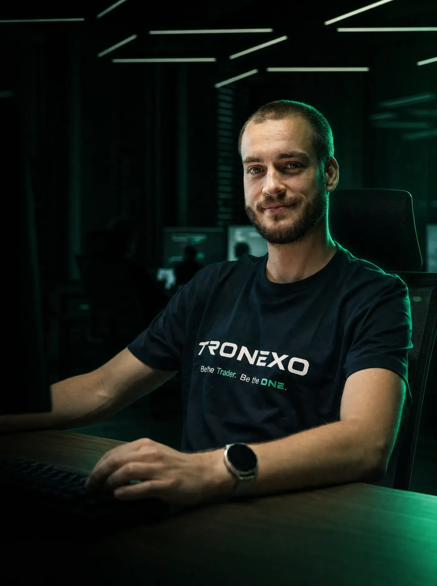 Matěj from TRONEXO support at his desk